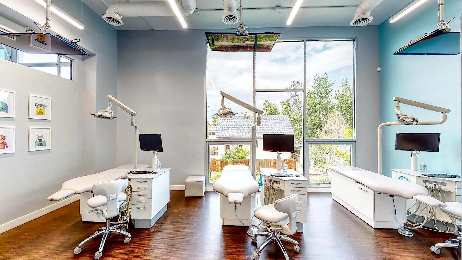 Modern dental operatory with three treatment chairs