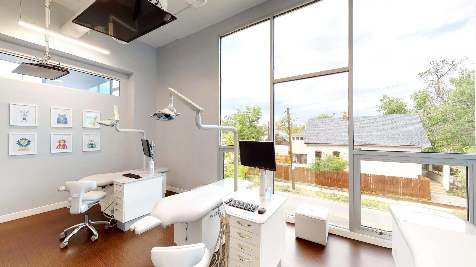 Modern dental clinic room with large windows