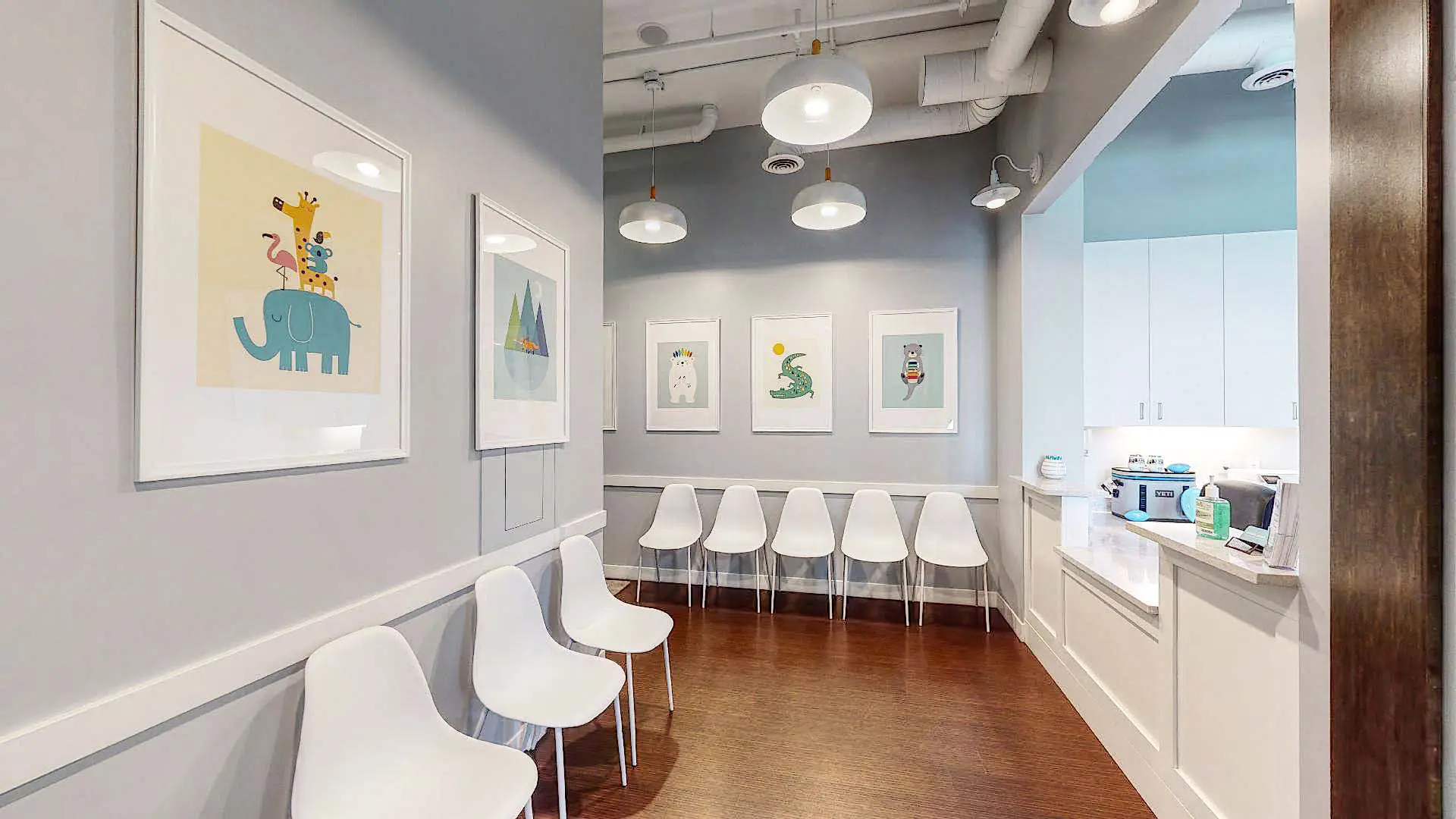 Modern pediatric waiting room with colorful artwork