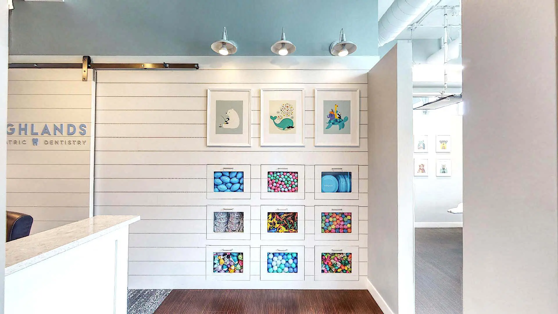 Colorful framed artwork display in dental office
